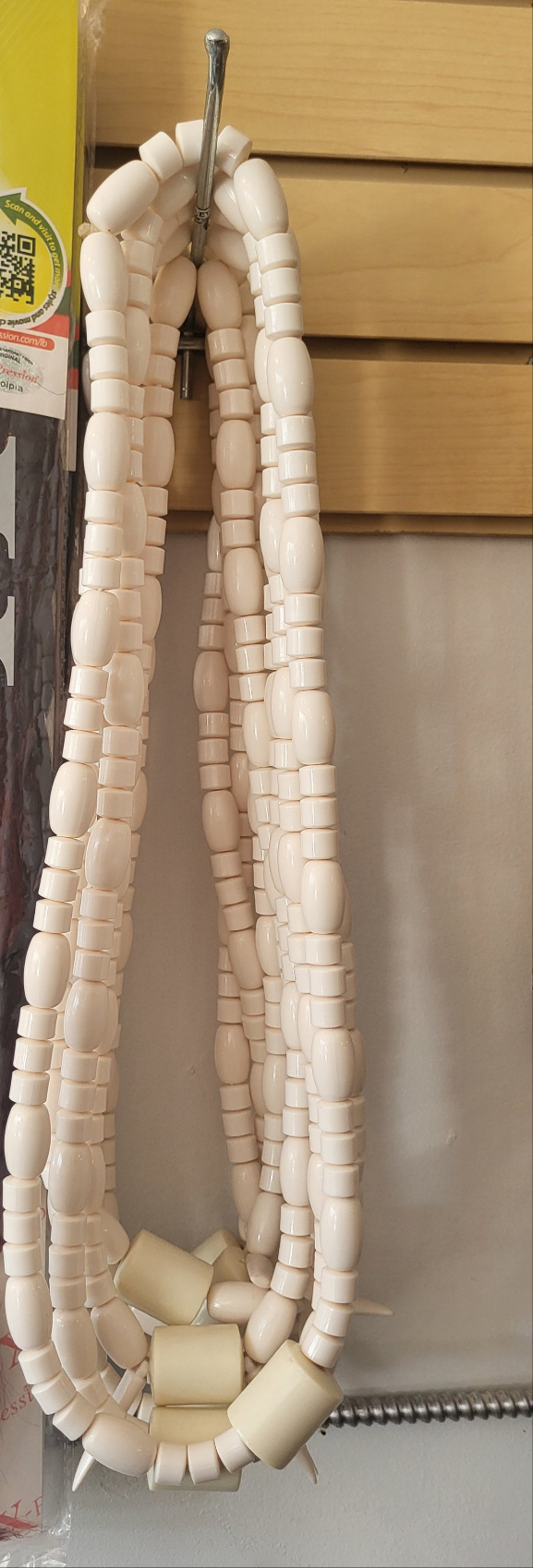 Nigerian traditional cultural bride and groom long neck bead