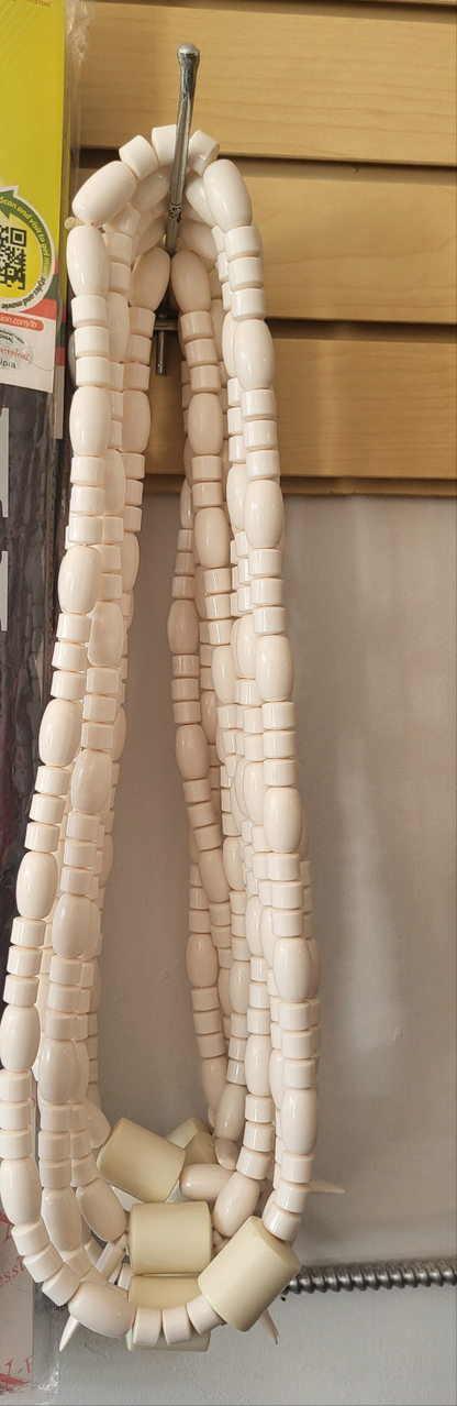 Nigerian traditional cultural bride and groom long neck bead