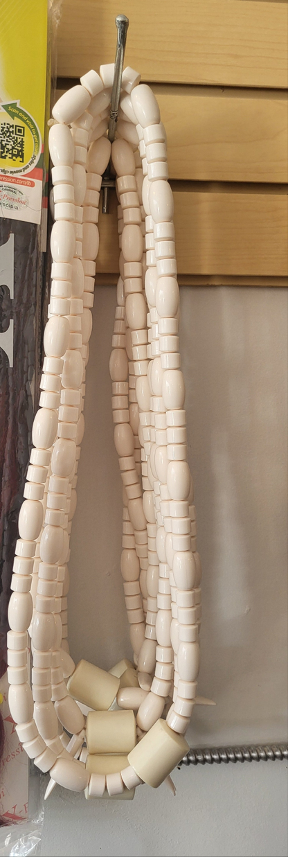 Nigerian traditional cultural bride and groom long neck bead