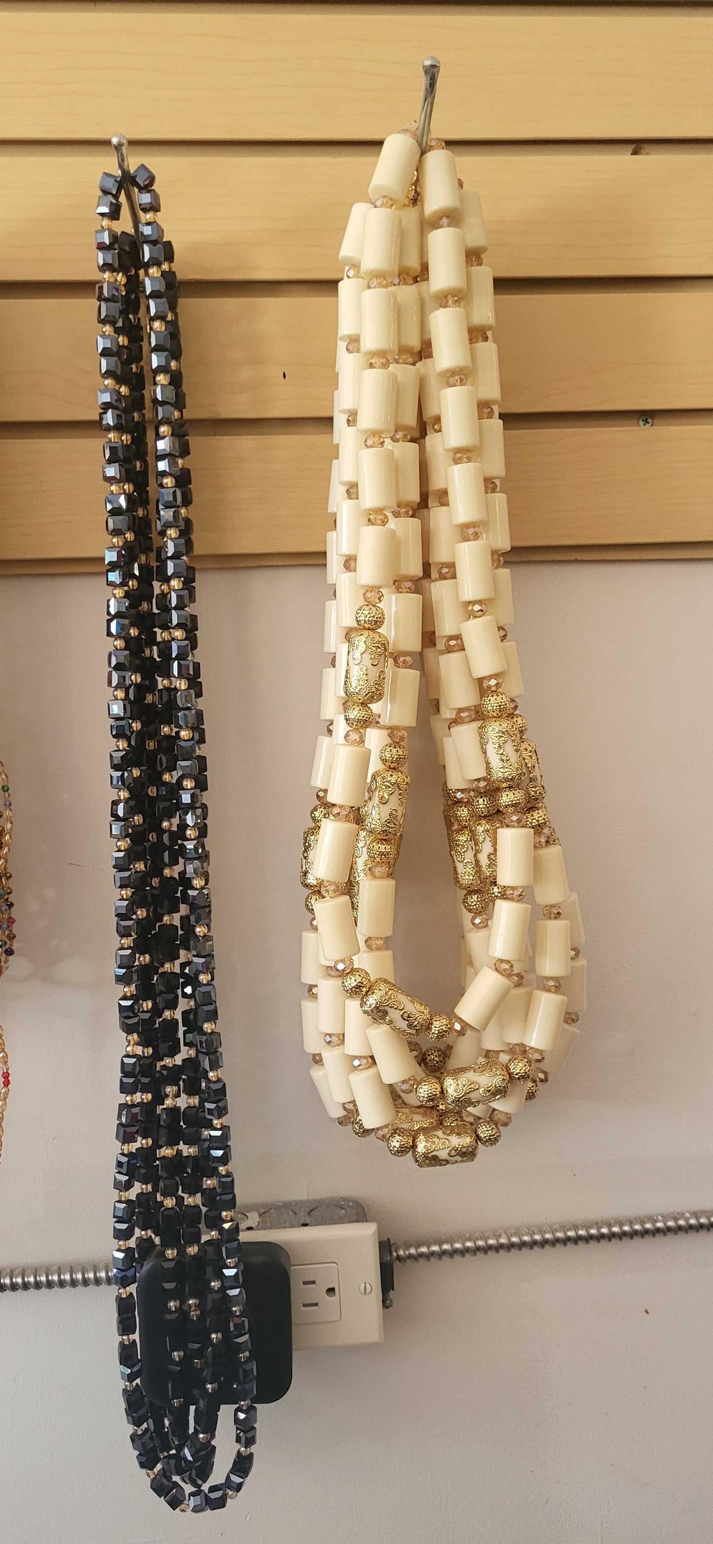 Nigerian traditional cultural bride and groom long neck bead