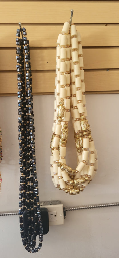 Nigerian traditional cultural bride and groom long neck bead