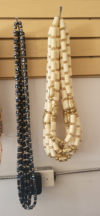 Nigerian traditional cultural bride and groom long neck bead