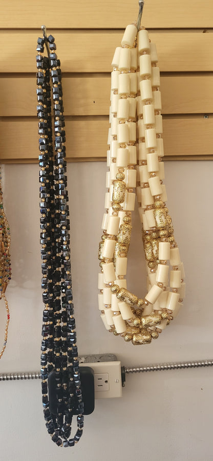 Nigerian traditional cultural bride and groom long neck bead